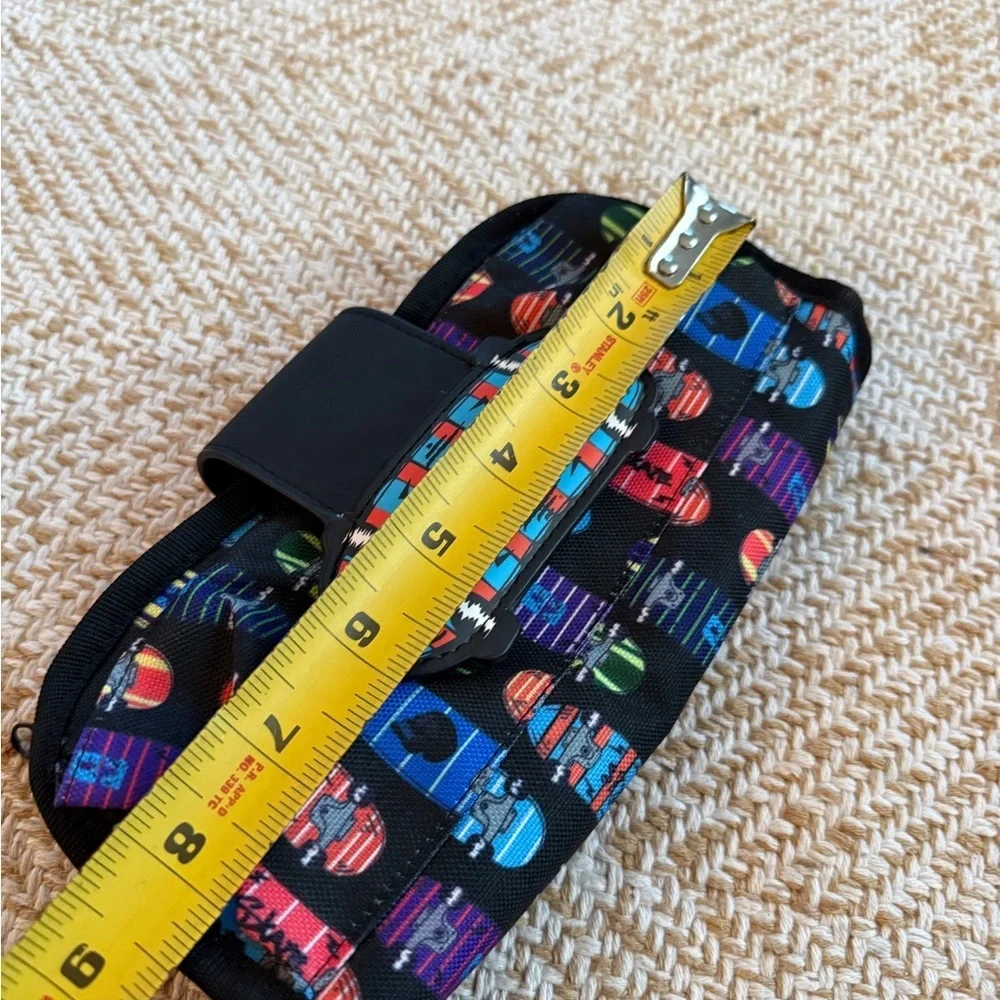 ZIPIT brand fanny pack or hip pouch, featuring a vibrant skateboard pattern